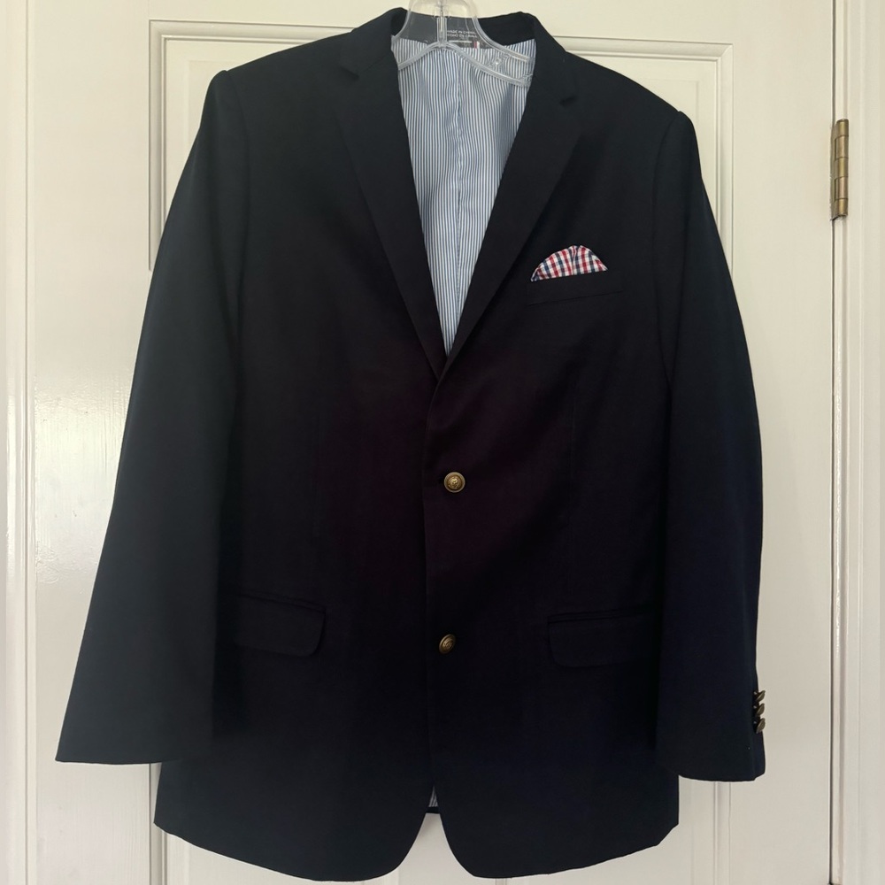 Tommy Hilfiger navy blazer, boy size 20. Excellent condition.